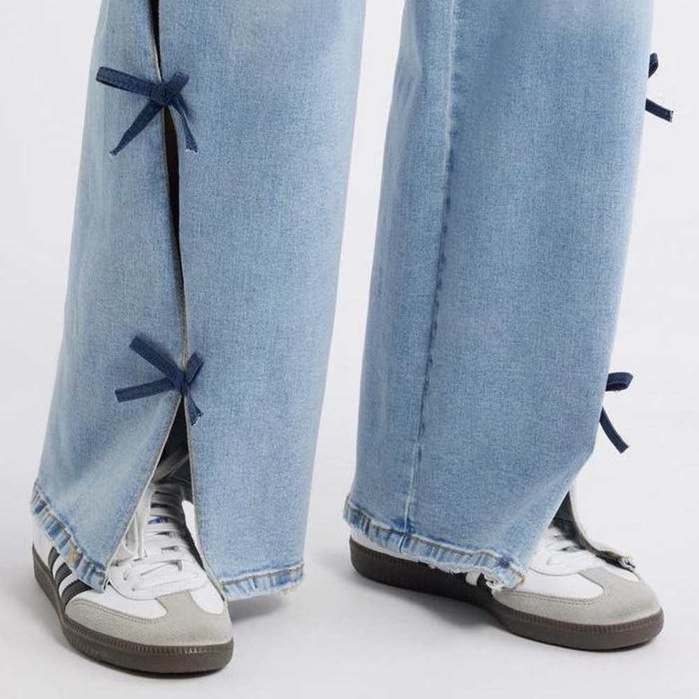Stylish Light Blue Flare Jeans with Navy Accents - Picture 2 of 8